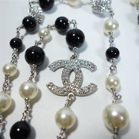 chanel background white|chanel black and white necklace.